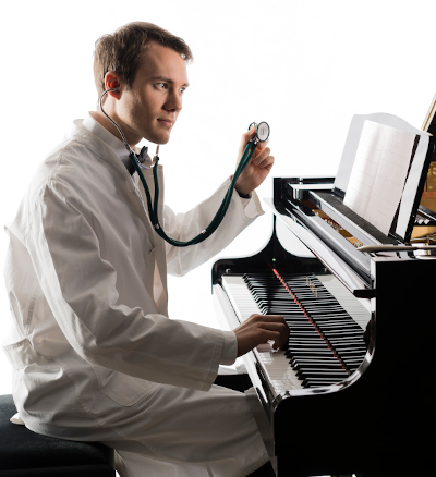 Dr. Firle plays piano